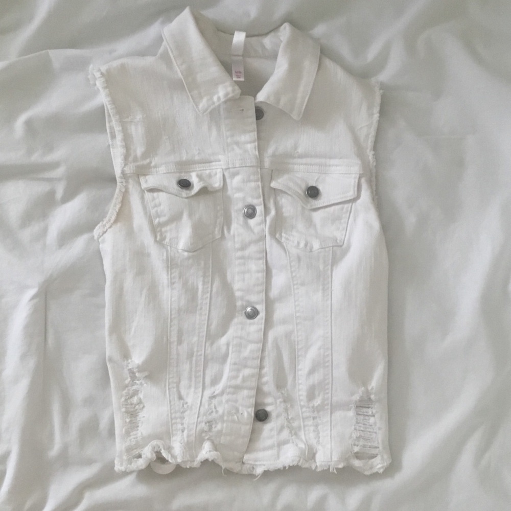 Distressed denim vest